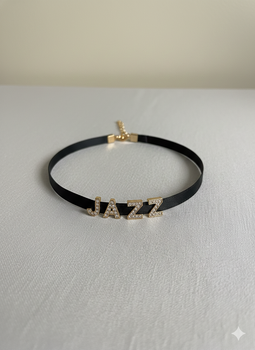 Black Flowerz choker necklace with 'JAZZ' letters on a light gray background